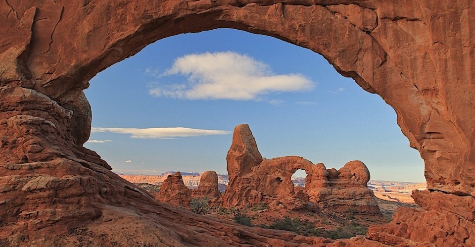 Turret-Arch-through-North-Window-Arches-National-Park-960x640